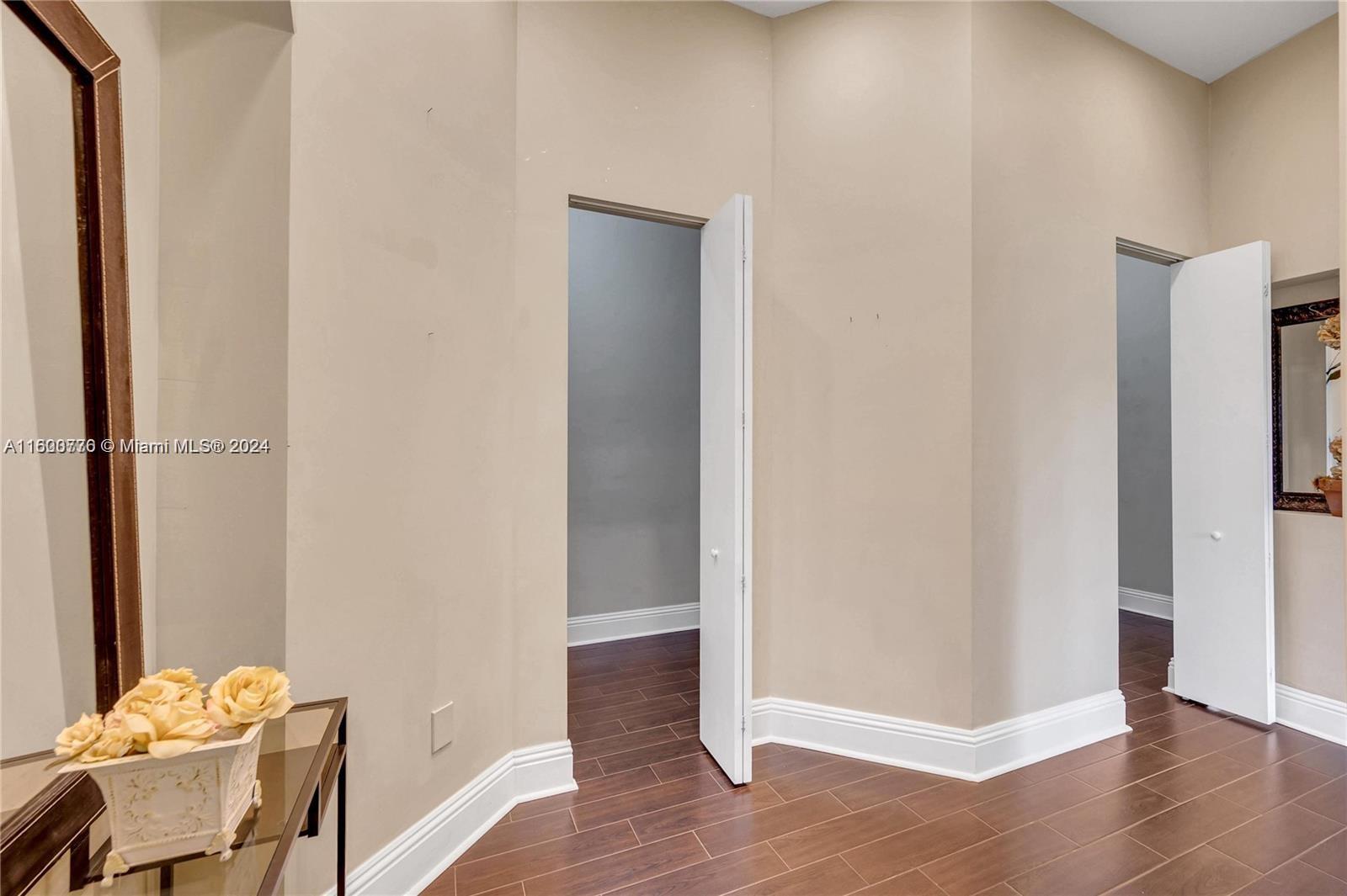 10901 Southwest 91st Street Miami, FL 33176 - Photo 29 of 69 a view of room with hardwood floor and hallway
