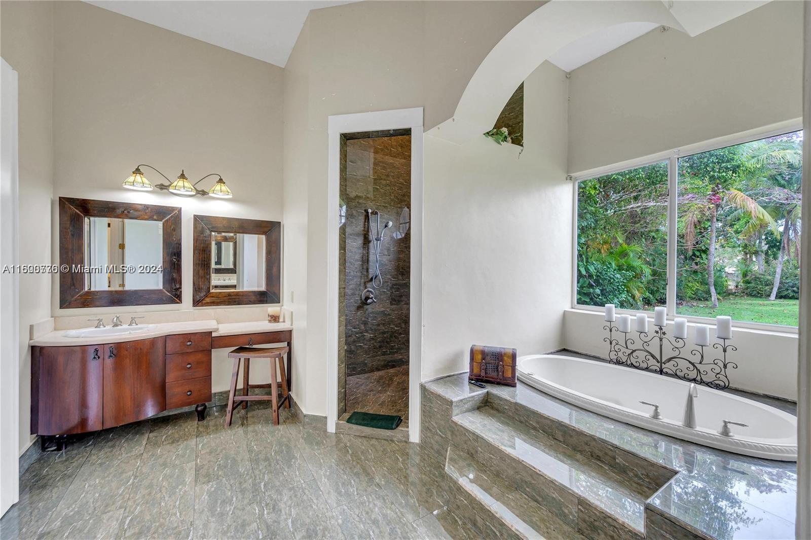 10901 Southwest 91st Street Miami, FL 33176 - Photo 32 of 69 a living room with furniture and a large window