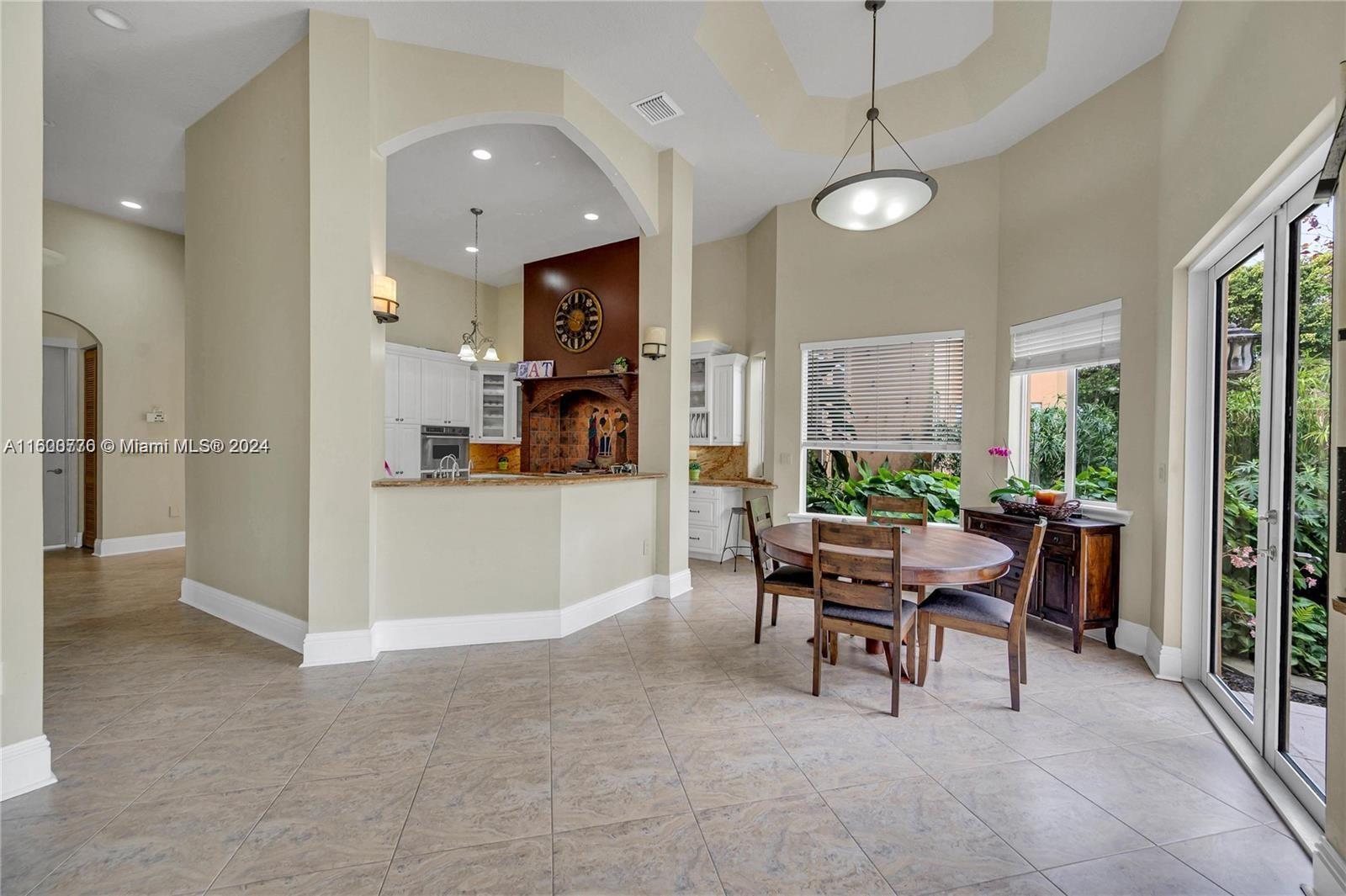 10901 Southwest 91st Street Miami, FL 33176 - Photo 10 of 69 a view of a kitchen and dining room