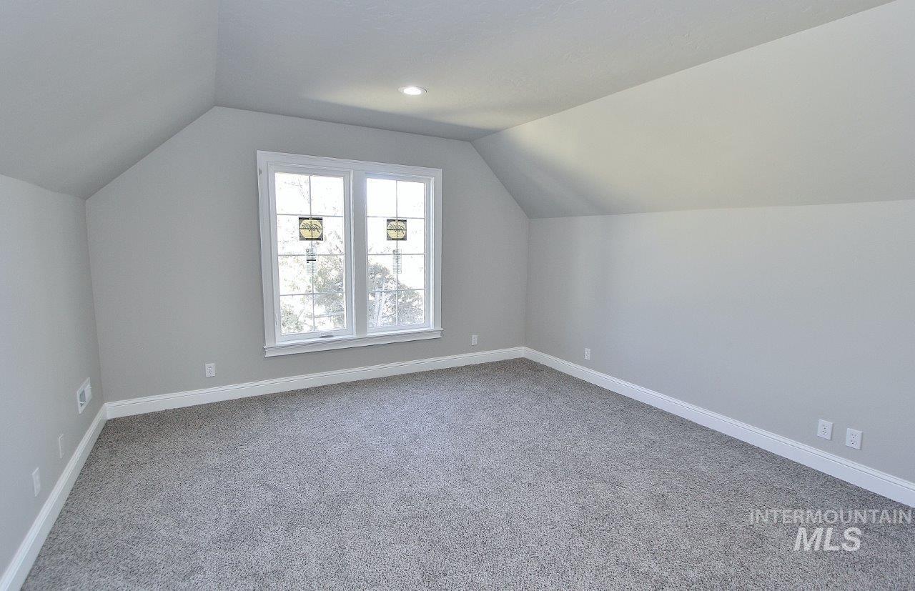 121 Northwest 2nd Street Ontario, OR 97914 - Photo 29 of 32 Bonus room featuring baseboards and light carpet
