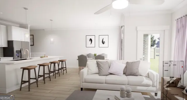 a living room with furniture and wooden floor