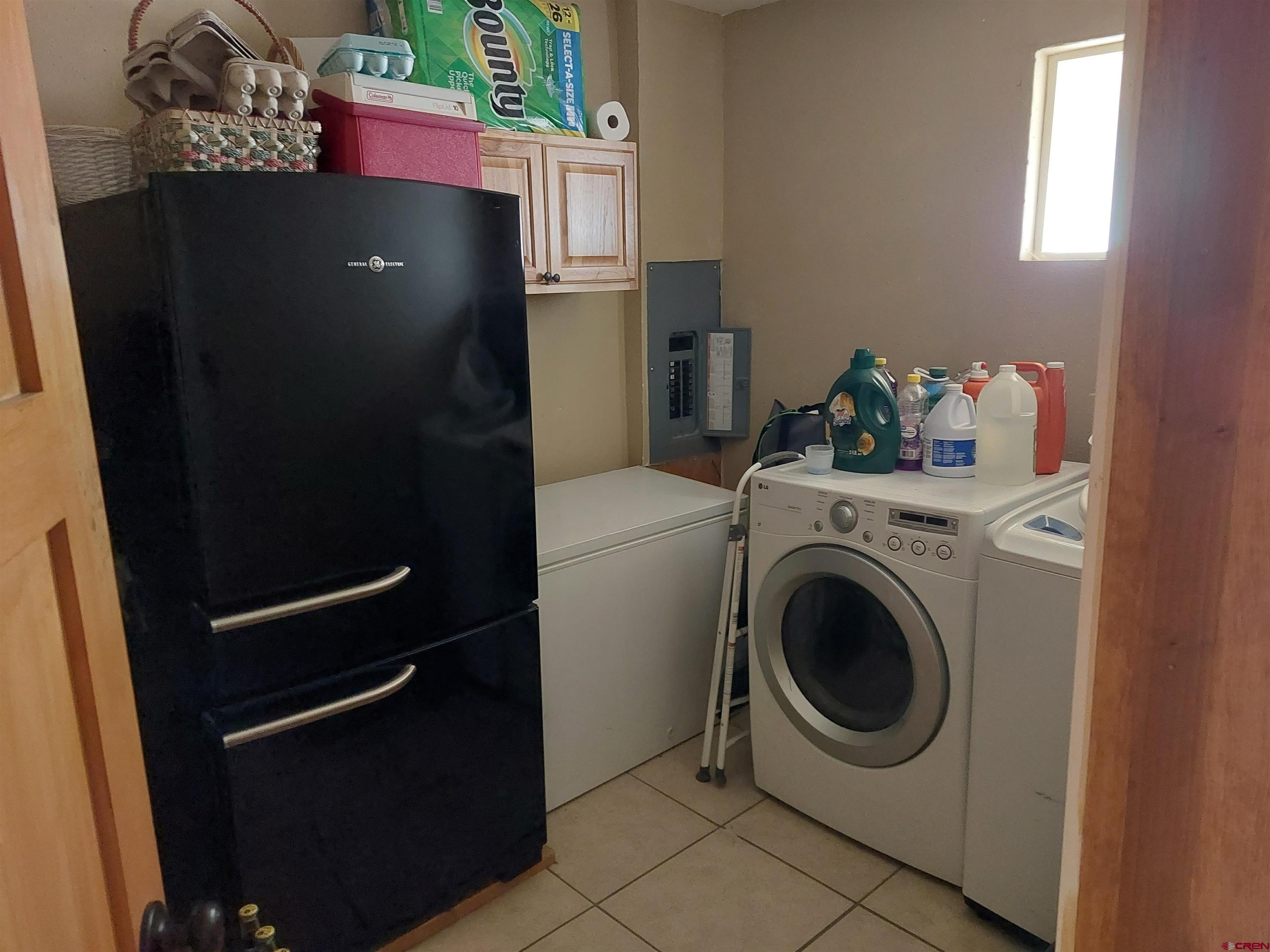 14663 Road N 3 Cahone Co 81320 Cahone, CO 81320 - Photo 11 of 20 a utility room with dryer and washer