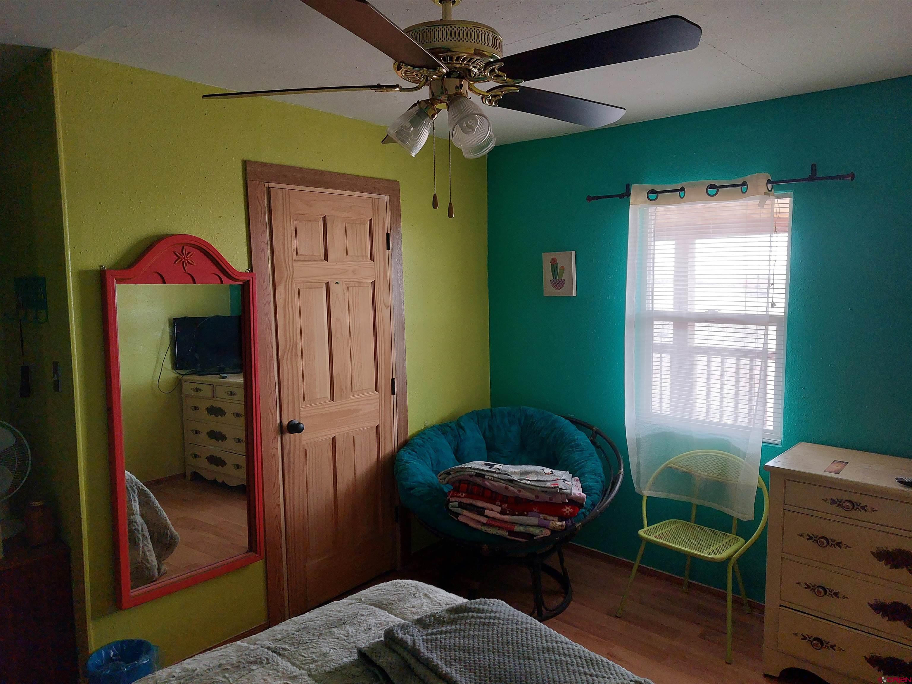 14663 Road N 3 Cahone Co 81320 Cahone, CO 81320 - Photo 8 of 20 a living room with furniture and a window