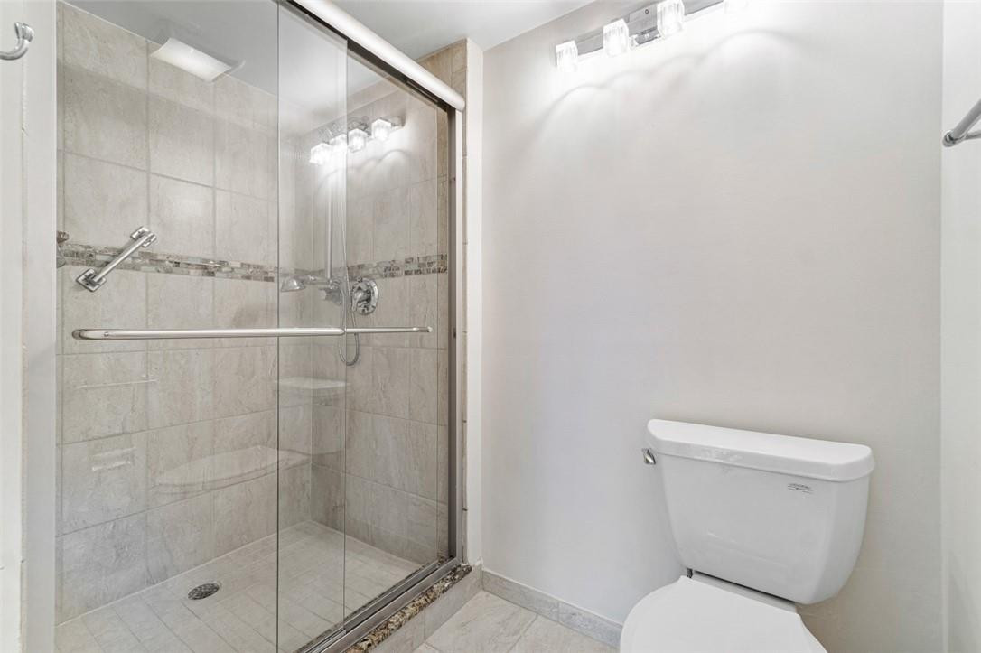 6181 Balboa Circle, Unit 201 Boca Raton, FL 33433 - Photo 22 of 32 Master bathroom walk in shower.