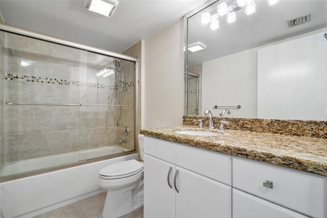 6181 Balboa Circle, Unit 201 Boca Raton, FL 33433 - Photo 23 of 32 Guest bath with tub and shower.