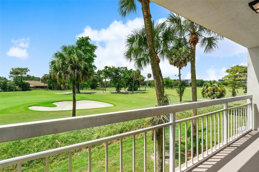 6181 Balboa Circle, Unit 201 Boca Raton, FL 33433 - Photo 10 of 32 Large useable balcony off living room.