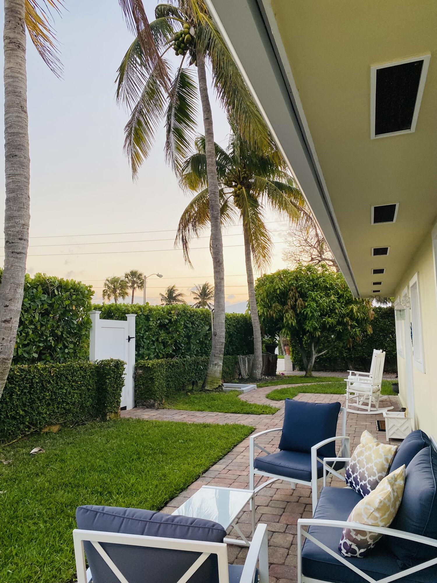 5501 North Ocean Boulevard Ocean Ridge, FL 33435 - Photo 18 of 21 a view of backyard of house with seating area