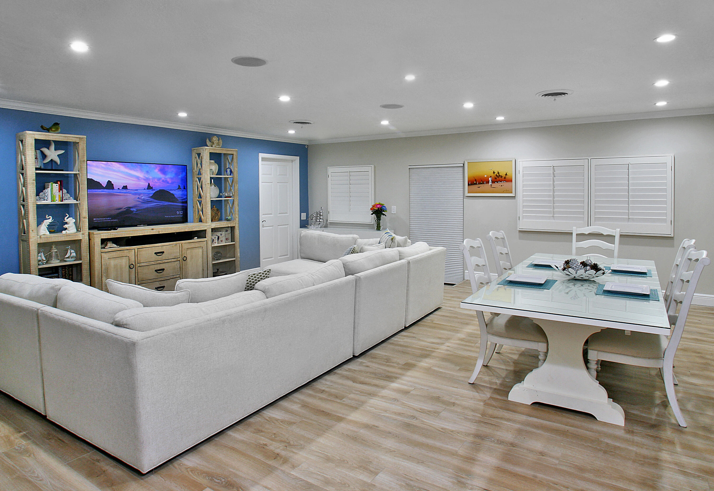 5501 North Ocean Boulevard Ocean Ridge, FL 33435 - Photo 10 of 21 a living room with furniture and a flat screen tv