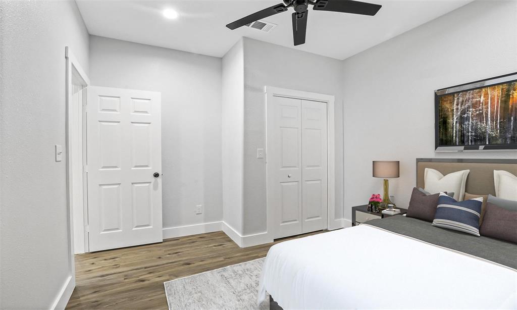 516 East Heron Street Denison, TX 75021 - Photo 17 of 24 a bedroom with a bed and furniture