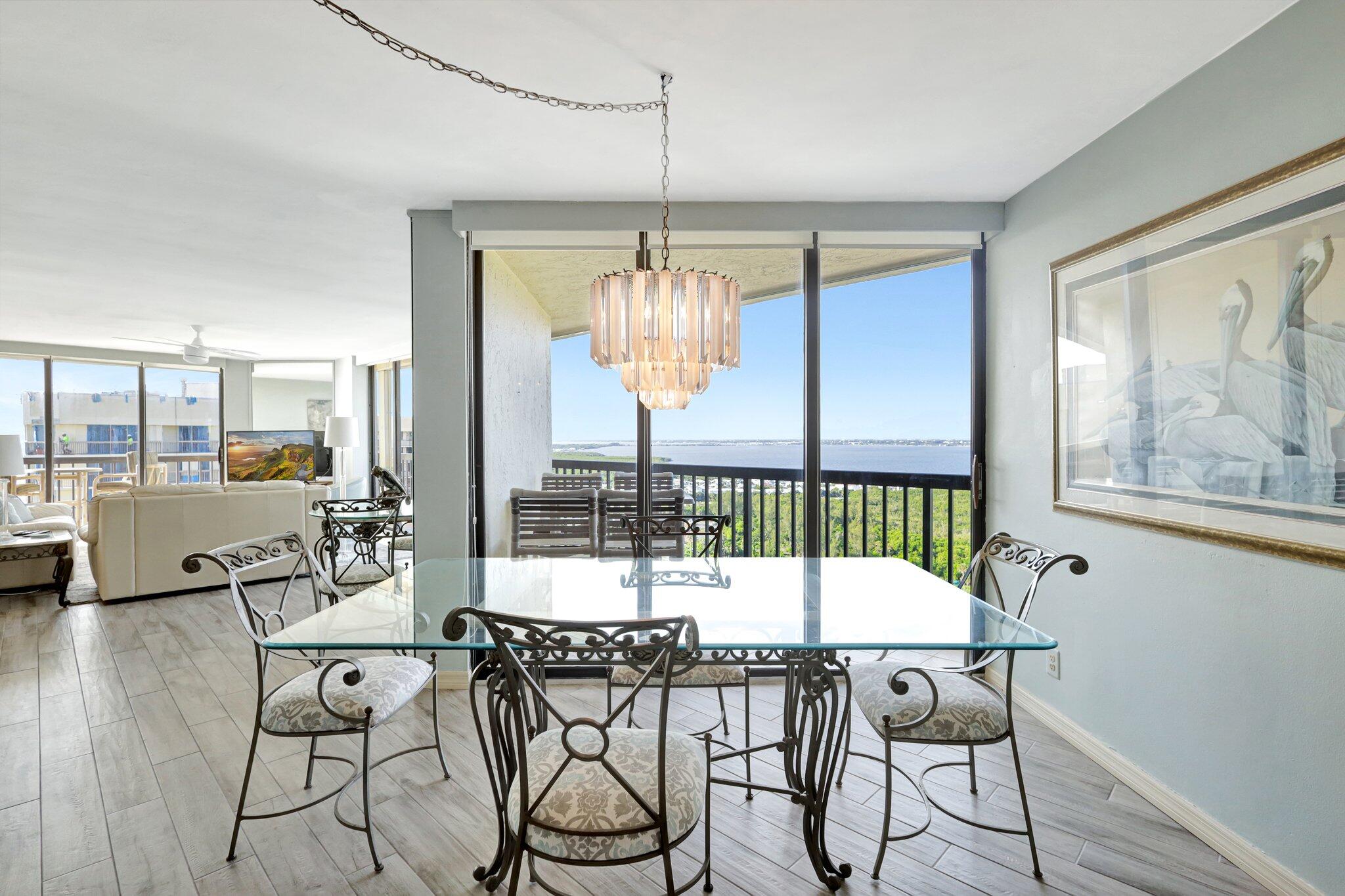 9500 South Ocean Drive, Unit PH10 Jensen Beach, FL 34957 - Photo 12 of 41 a view of a dining room with furniture window and outside view