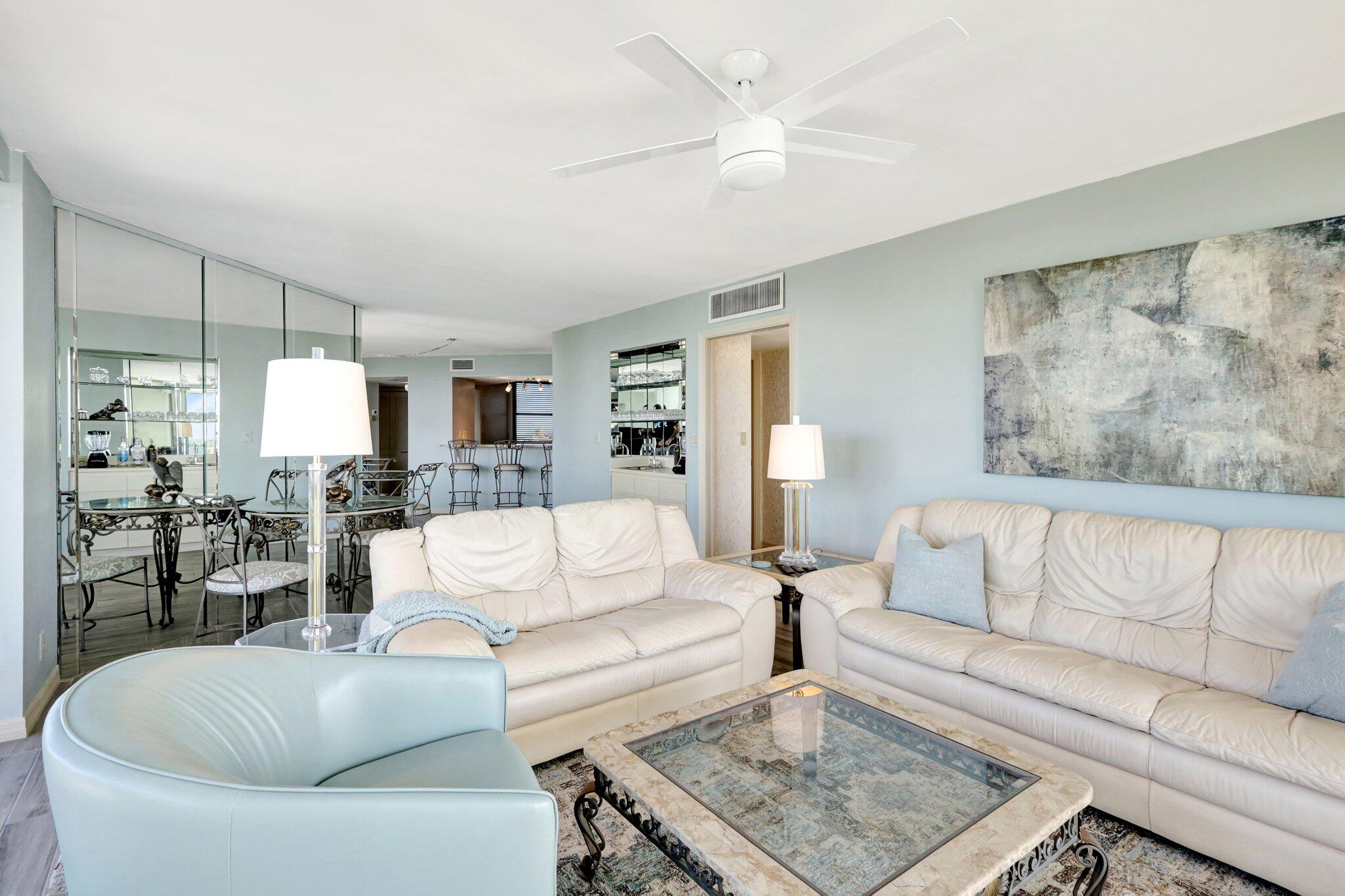9500 South Ocean Drive, Unit PH10 Jensen Beach, FL 34957 - Photo 20 of 41 a living room with furniture and a large window