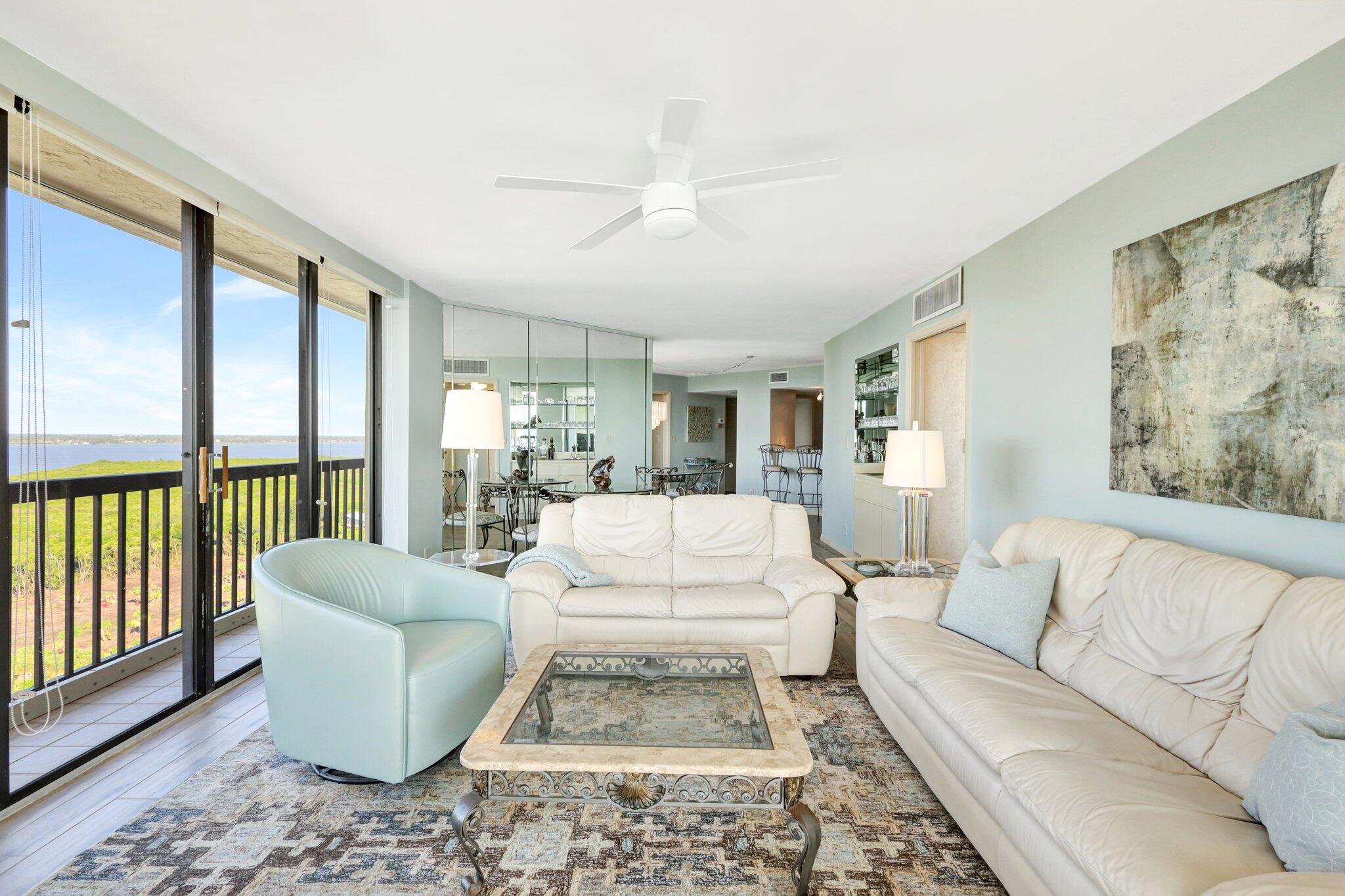 9500 South Ocean Drive, Unit PH10 Jensen Beach, FL 34957 - Photo 21 of 41 a living room with furniture and a rug