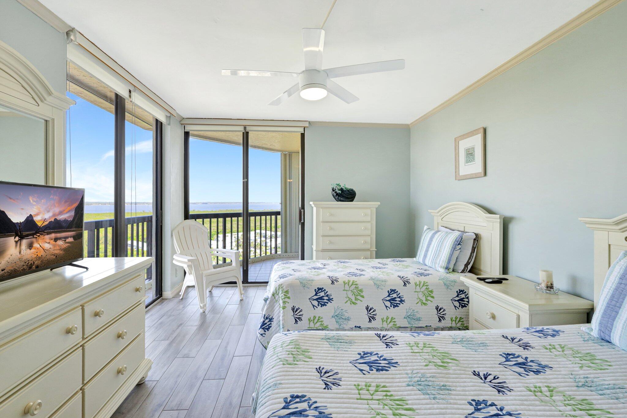 9500 South Ocean Drive, Unit PH10 Jensen Beach, FL 34957 - Photo 31 of 41 a bedroom with a large bed and a flat tv screen