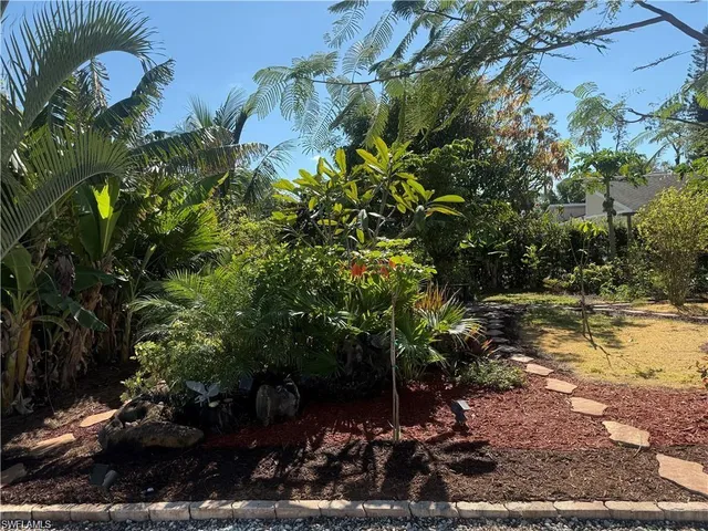 $675,000 | 119 Flame Vine Drive, Naples, FL 34110