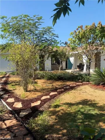 $675,000 | 119 Flame Vine Drive, Naples, FL 34110