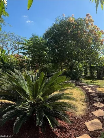 $675,000 | 119 Flame Vine Drive, Naples, FL 34110