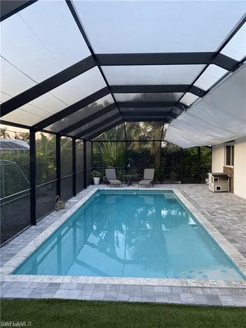 $675,000 | 119 Flame Vine Drive, Naples, FL 34110