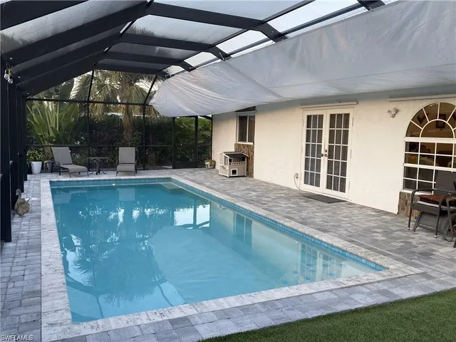 $675,000 | 119 Flame Vine Drive, Naples, FL 34110