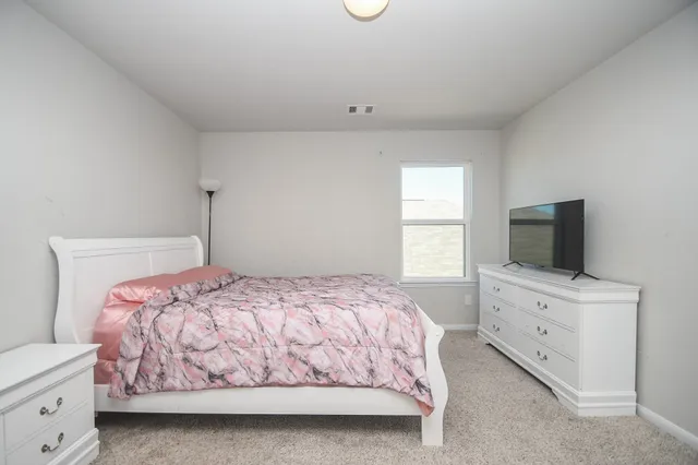 a view of a workspace with furniture