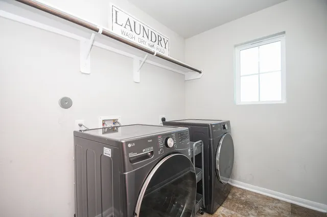 a backyard of a house with wooden fence