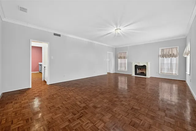 a spacious bathroom with a granite countertop sink and a mirror