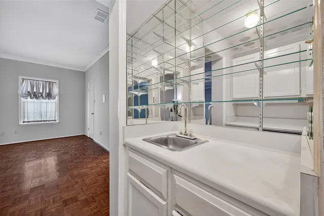 a kitchen with stainless steel appliances granite countertop a stove and a microwave