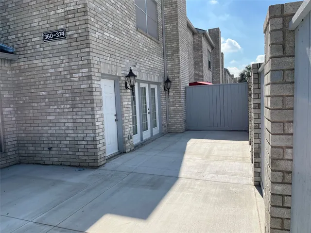 a view of a livingroom with a ceiling fan and window