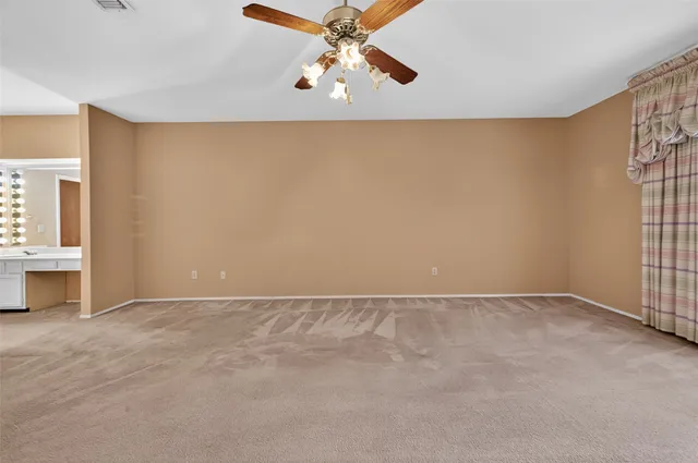 a bathroom with a sink double vanity and a mirror