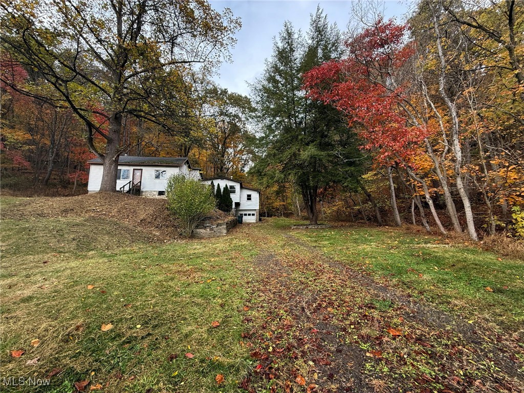 4589 Harmon Creek Road Colliers, WV 26035 - Photo 3 of 26 View of grassy yard