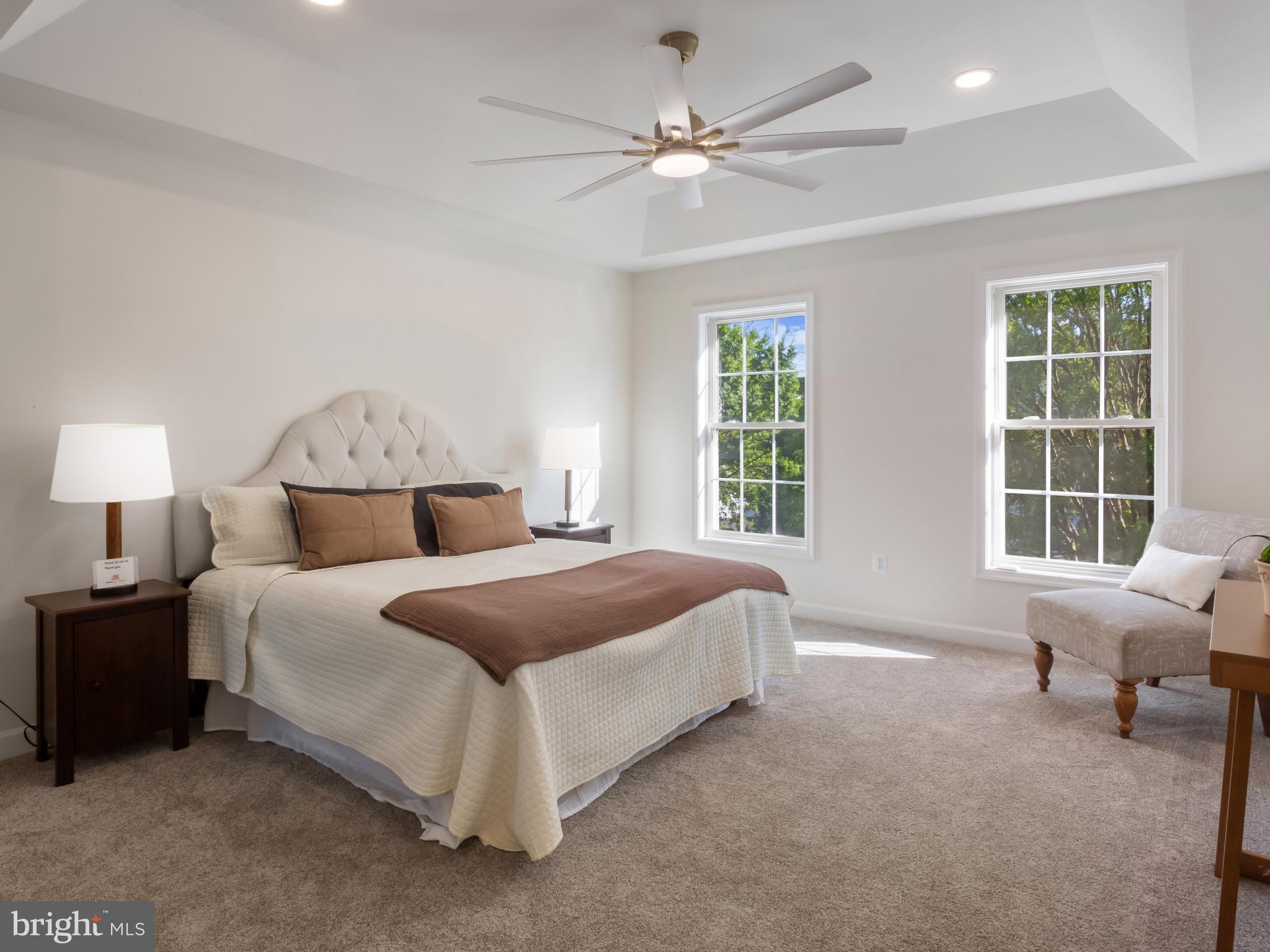 1612 Winesapp Drive Odenton, MD 21113 - Photo 15 of 34 a spacious bedroom with a bed and a window