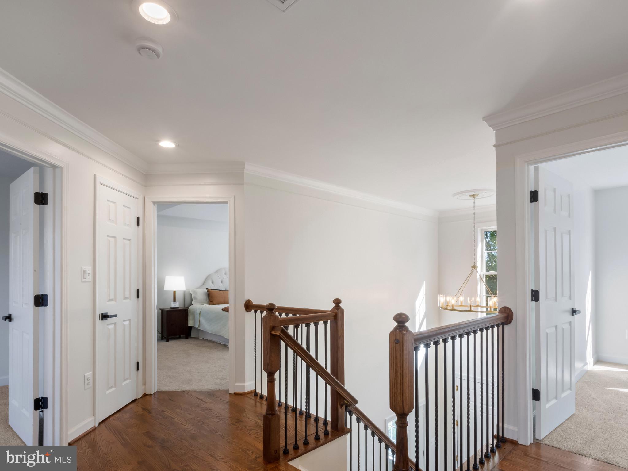 1612 Winesapp Drive Odenton, MD 21113 - Photo 19 of 34 a view of a hallway with livingroom and furniture