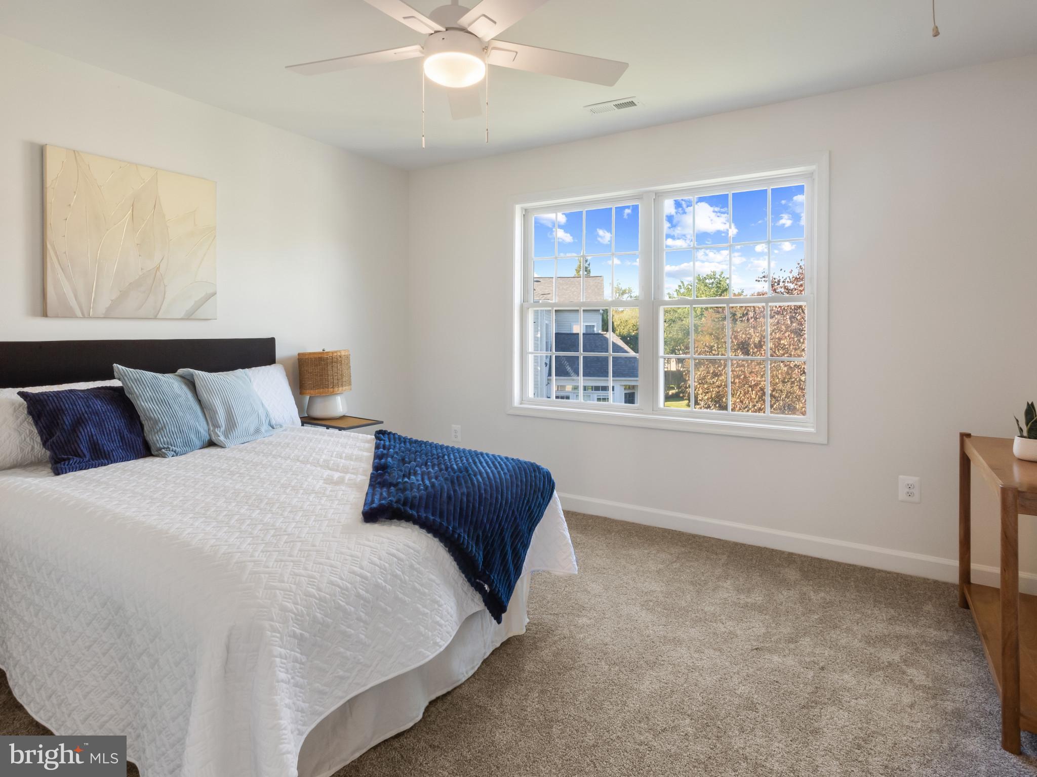 1612 Winesapp Drive Odenton, MD 21113 - Photo 20 of 34 a bedroom with a large bed and a window