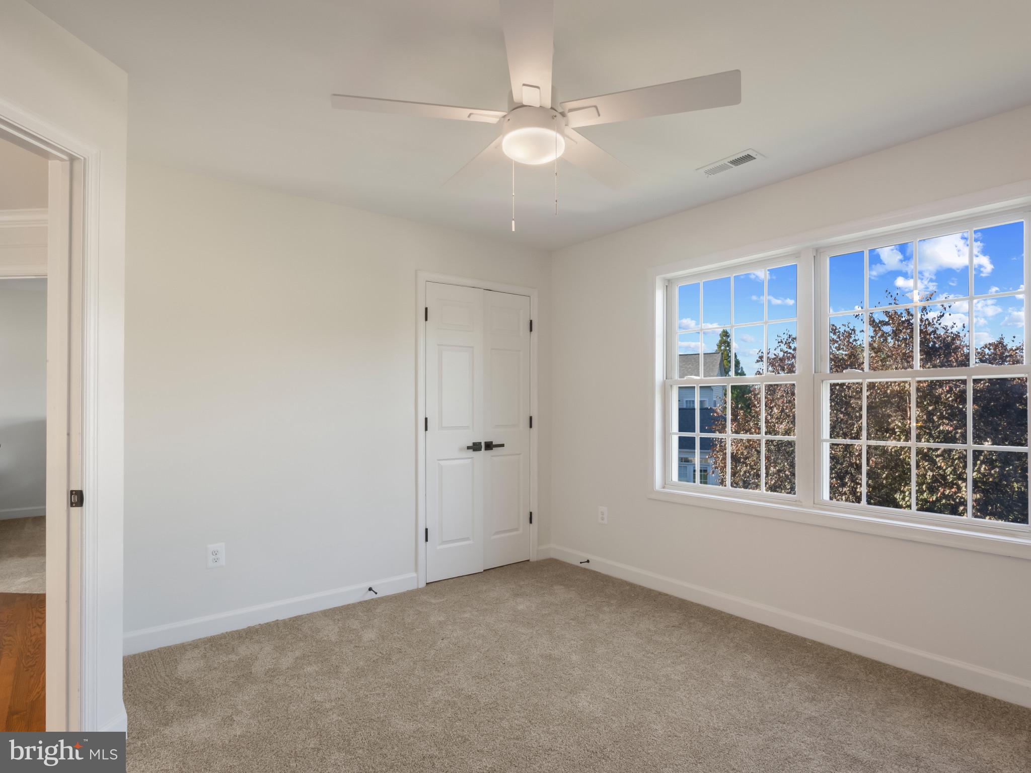 1612 Winesapp Drive Odenton, MD 21113 - Photo 24 of 34 a view of an empty room with a window