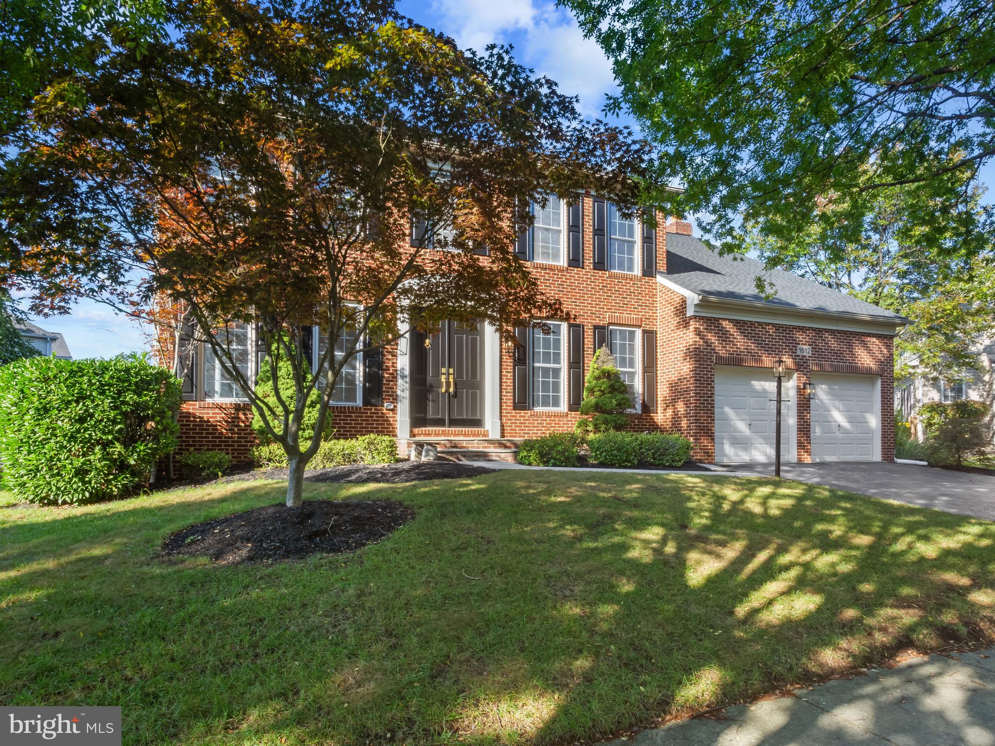 1612 Winesapp Drive Odenton, MD 21113 - Photo 34 of 34 a front view of a house with a garden