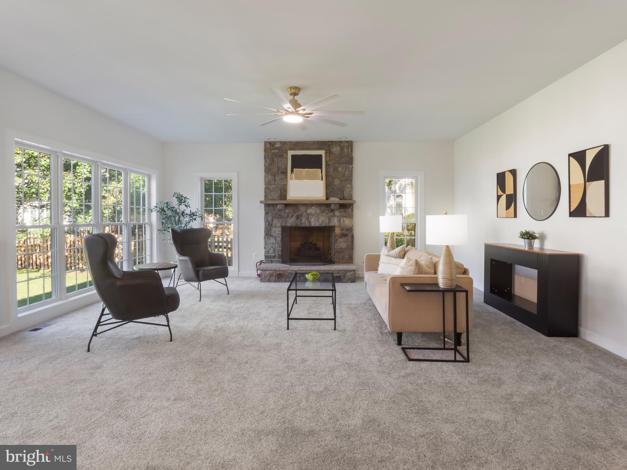 1612 Winesapp Drive Odenton, MD 21113 - Photo 5 of 34 a living room with furniture and a fireplace