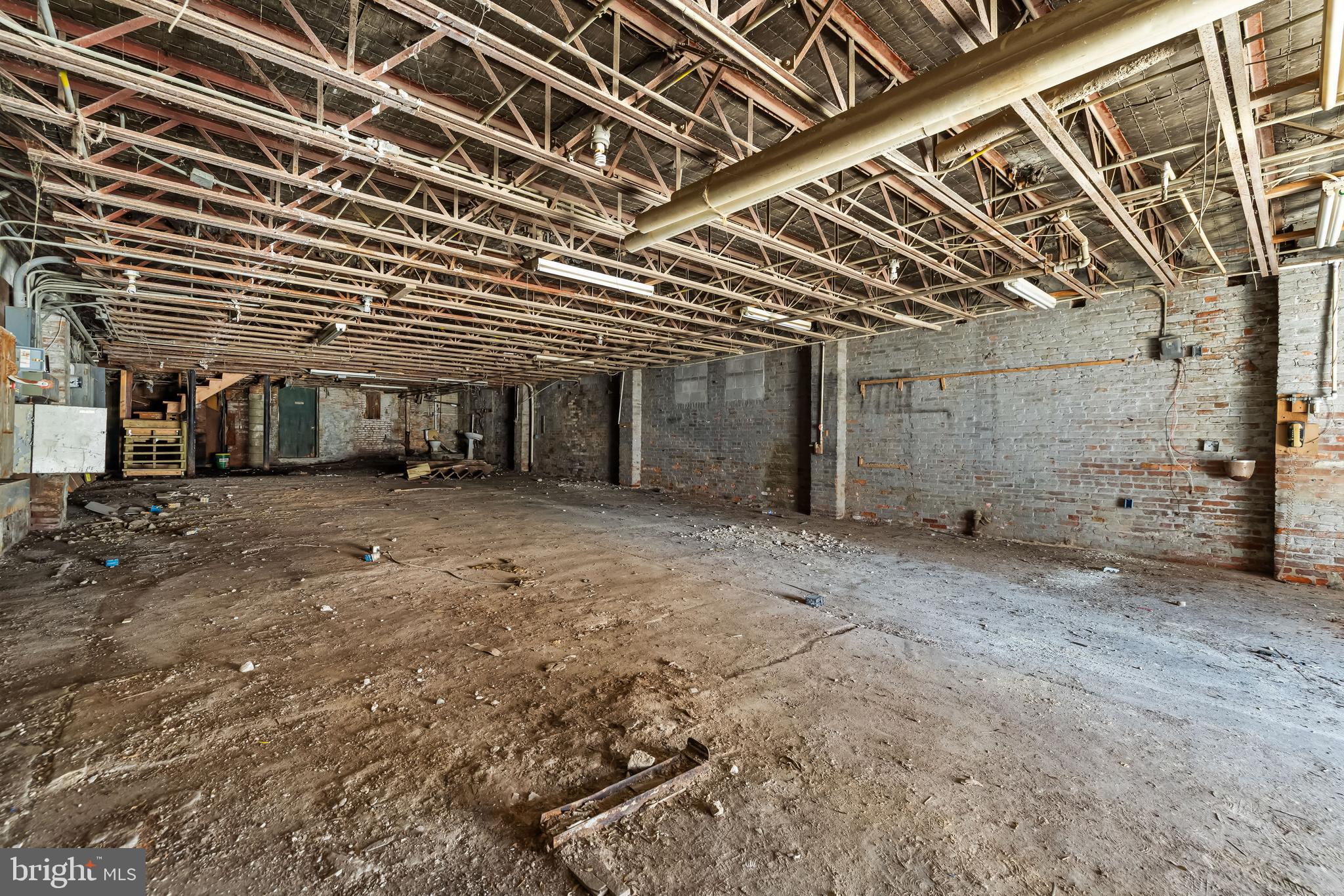 858 Tyson Street Baltimore, MD 21201 - Photo 12 of 20 a view of a room with wooden walls