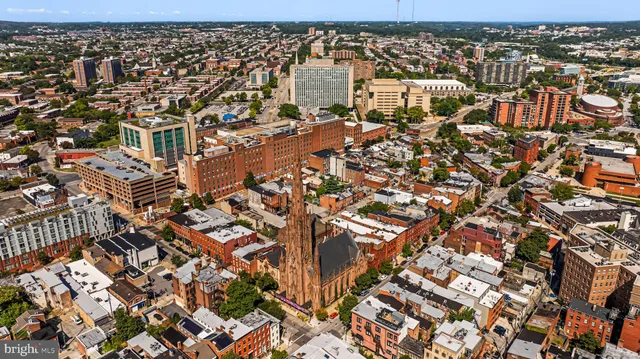an aerial view of a city with lots of residential buildings