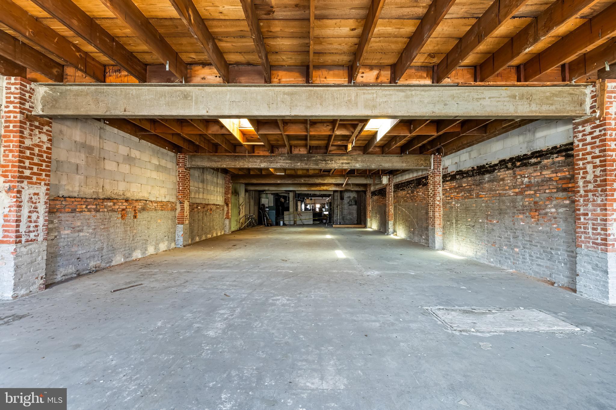 858 Tyson Street Baltimore, MD 21201 - Photo 8 of 20 a view of empty room with a garage