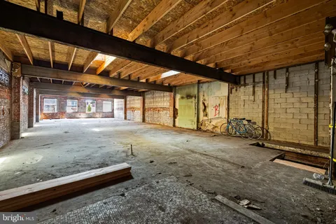 a view of a room with wooden walls