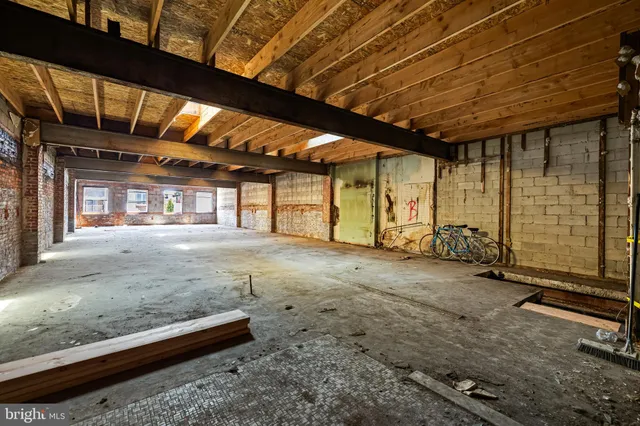 a view of a room with wooden walls