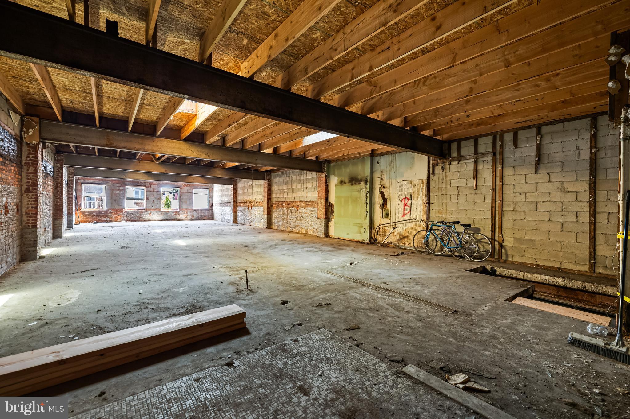 858 Tyson Street Baltimore, MD 21201 - Photo 10 of 20 a view of a room with wooden walls