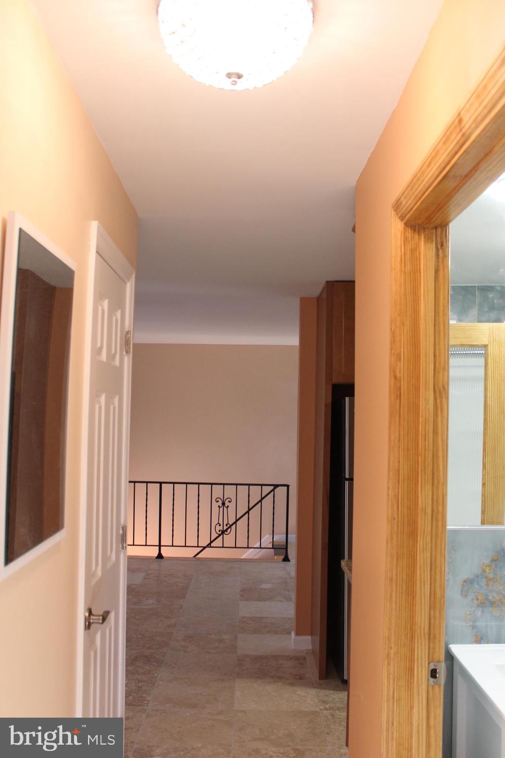 747 Garden Drive Harrisburg, PA 17111 - Photo 27 of 34 a view of a hallway with a door and stairs