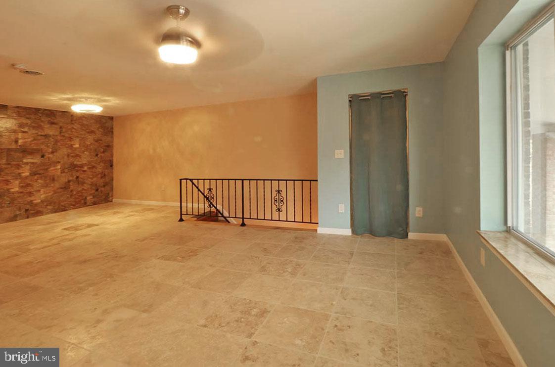 747 Garden Drive Harrisburg, PA 17111 - Photo 3 of 34 a view of an empty room with a window