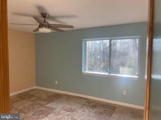 747 Garden Drive Harrisburg, PA 17111 - Photo 31 of 34 an empty room with a window