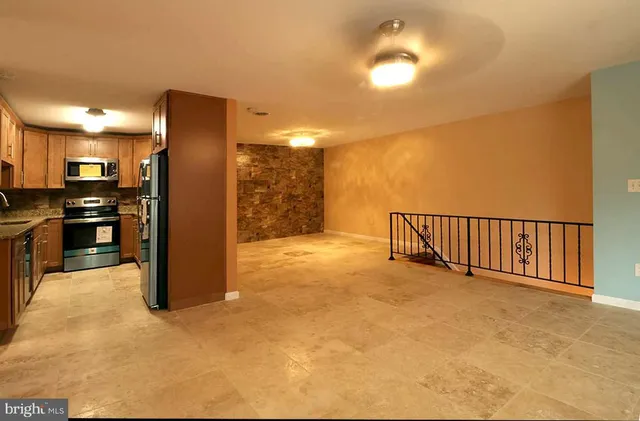 a view of a kitchen with a sink