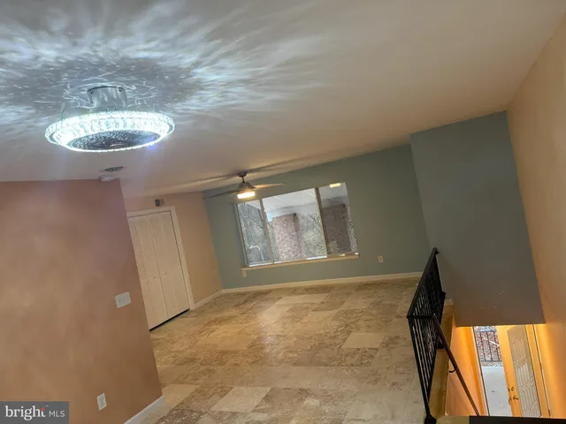 a view of empty room with a sink