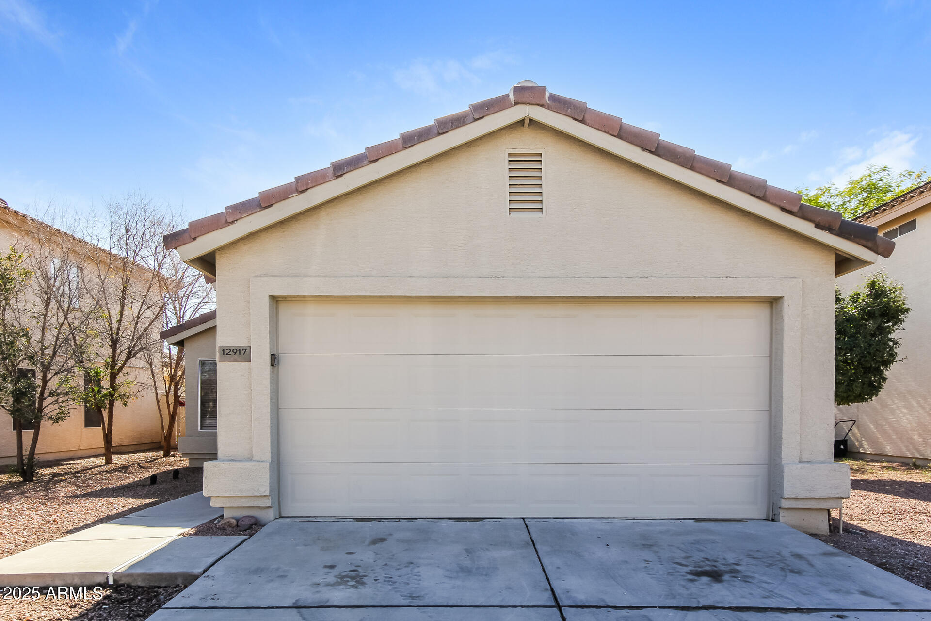 12917 West Laurel Lane El Mirage, AZ 85335 - Photo 1 of 16 1 front