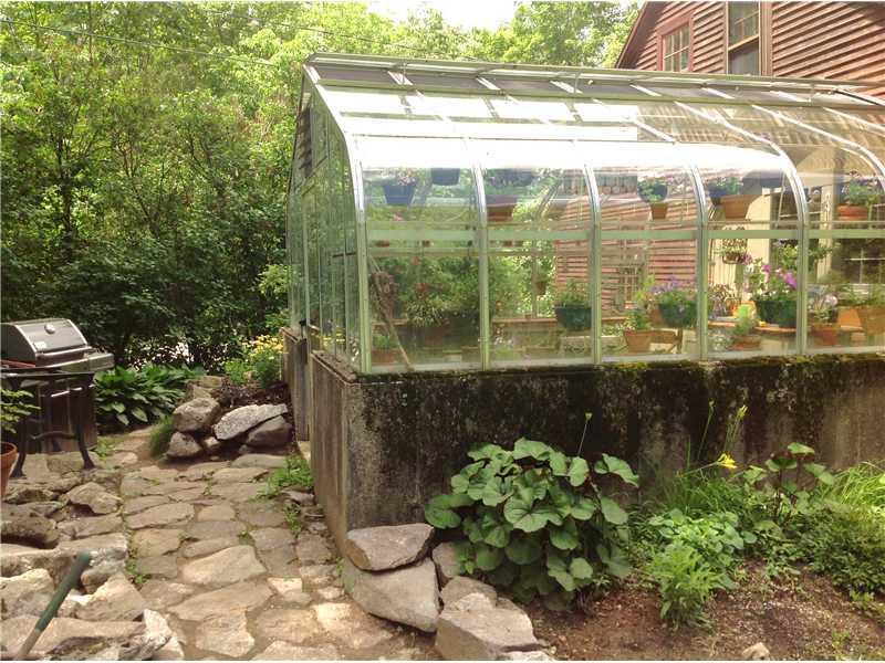 100 Joe Berry Road Cornish, ME 04020 - Photo 5 of 32 Patio/Deck. 14x16 Janco greenhouse...