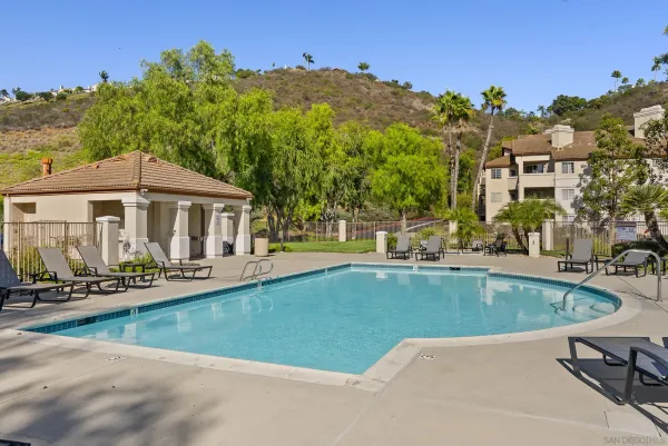 a view of a house with swimming pool