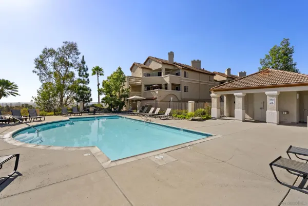 a front view of a house with swimming pool